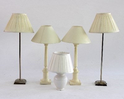 Lot 637 - A pair of painted wooden table lamps of column...