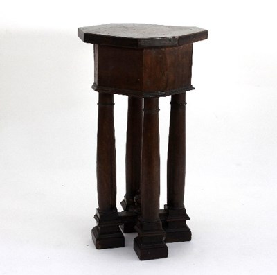 Lot 671 - An Italian walnut plinth, the canted square...