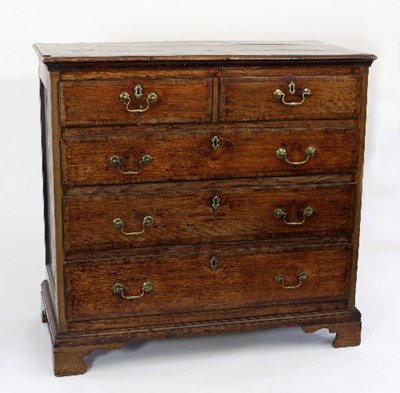 Lot 675 - A George III oak and crossbanded chest of two...