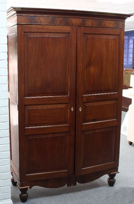 Lot 686 - A 19th Century mahogany cupboard enclosed by...