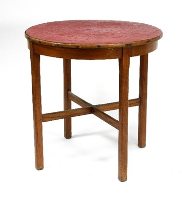 Lot 696 - An oak table, the circular top on square...