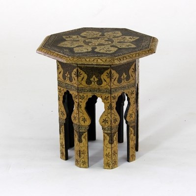 Lot 703 - A Moroccan painted octagonal table with...