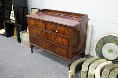 Lot 708 - A mahogany dressing table with gallery top and...