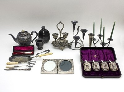 Lot 1 - A silver plated set of four salts and spoons...