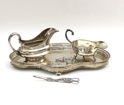 Lot 4 - A kidney-shaped silver plated tray, 43cm wide,...