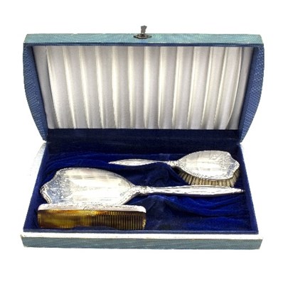 Lot 13 - A silver dressing set, comprising hand mirror,...