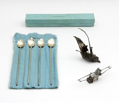 Lot 15 - A set of four long stemmed silver spoons,...