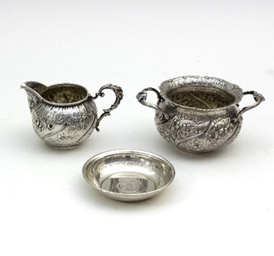 Lot 18 - A German silver sugar bowl and jug, each...