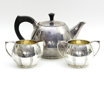 Lot 38 - A silver three-piece tea set, A M, Birmingham...