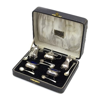 Lot 46 - A silver cased cruet set, marks rubbed,...