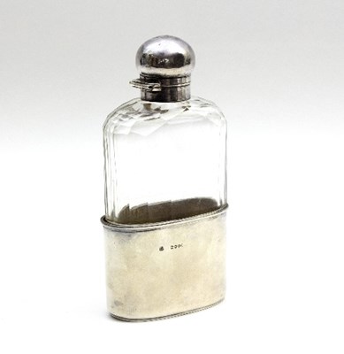 Lot 54 - A late Victorian silver mounted hip flask,...