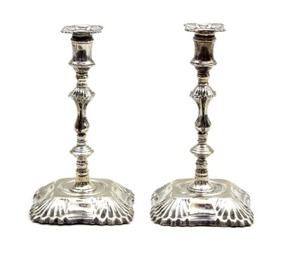 Lot 65 - A pair of Victorian silver taper sticks,...