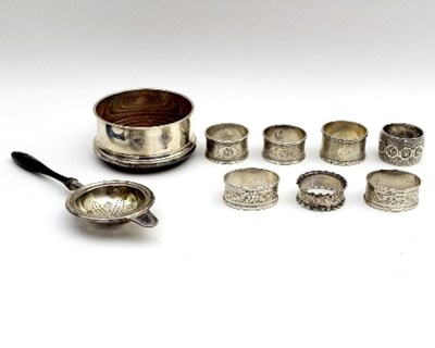 Lot 77 - Seven silver napkin rings, various assay...