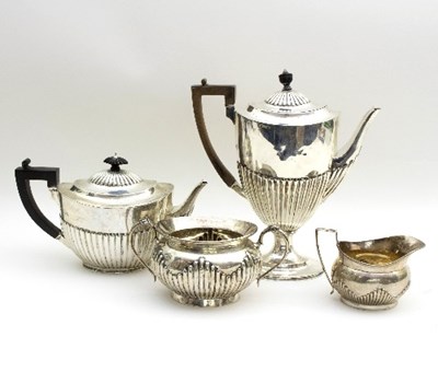 Lot 83 - A silver coffee pot and matching teapot,...