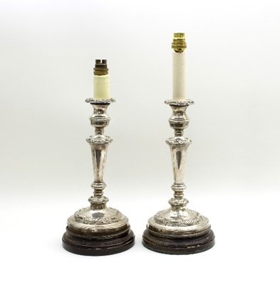 Lot 91 - A pair of George IV silver candlesticks,...