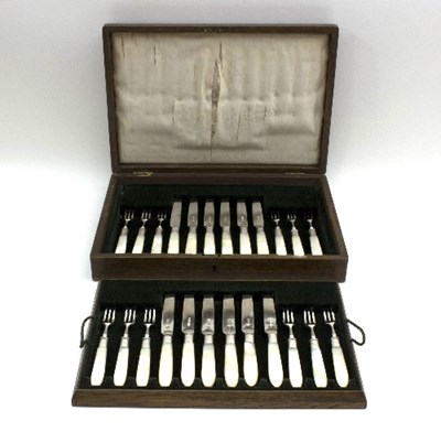 Lot 94 - A set of mother-of-pearl handled silver...