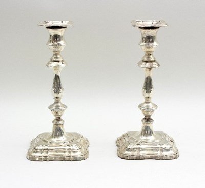 Lot 100 - A pair of silver candlesticks, Roberts & Belk,...