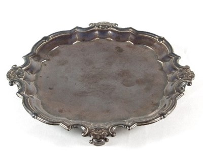 Lot 111 - A Georgian square shaped silver salver, Edward...