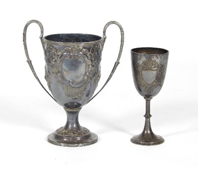 Lot 113 - A twin-handled silver trophy cup, Goldsmiths &...