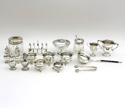 Lot 168 - A large quantity of silver salts, pepper pots,...