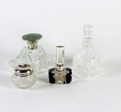 Lot 199 - A cut glass scent bottle, the cover with...