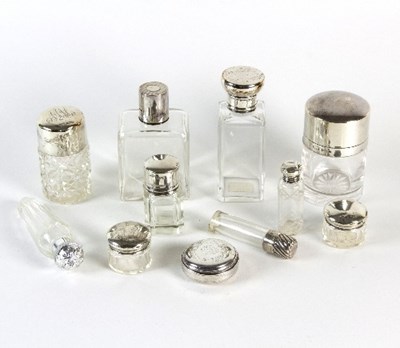 Lot 200 - A silver mounted scent bottle, the hinged...