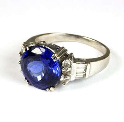 Lot 215 - A tanzanite and diamond dress ring, the...