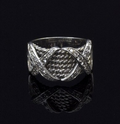 Lot 222 - A diamond dress ring, of rope twist design...