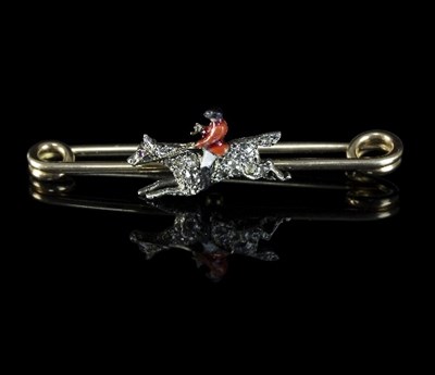 Lot 228 - A diamond and enamel bar brooch modelled as a...