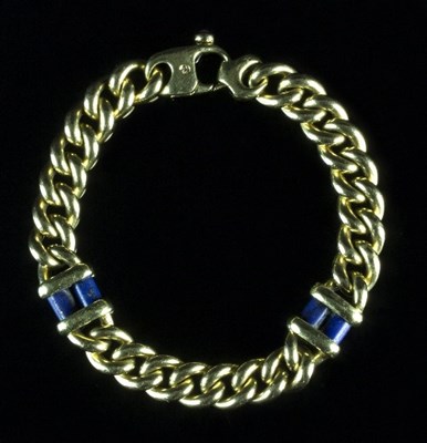 Lot 232 - An 18ct gold link bracelet with two lapis...