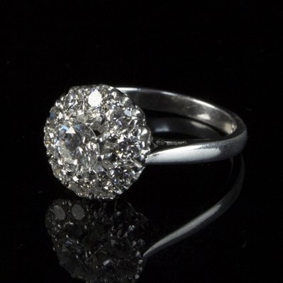 Lot 238 - A diamond cluster ring, the eleven-stone...