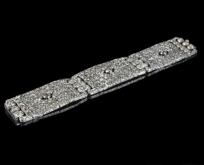 Lot 250 - An Art Deco style diamond articulated cuff...