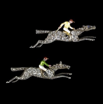 Lot 264 - Two diamond and enamel racehorse and jockey...