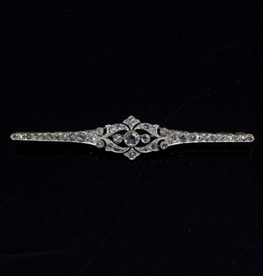 Lot 265 - A diamond set bar brooch, the foliate motif...