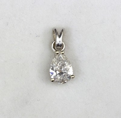 Lot 267 - A pear shaped diamond pendant set in an...