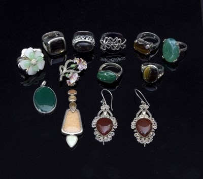 Lot 275 - A quantity of dress rings, pendants, etc. set...