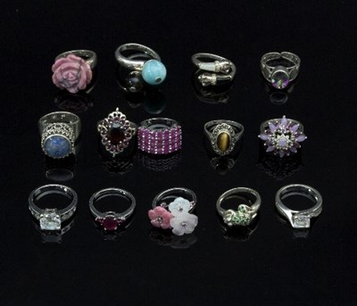 Lot 276 - Fourteen dress rings, mostly set with...