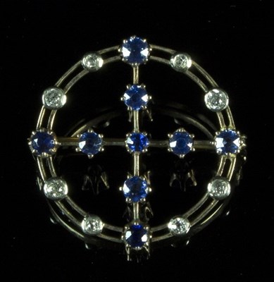 Lot 293 - A sapphire and diamond brooch, the circular...