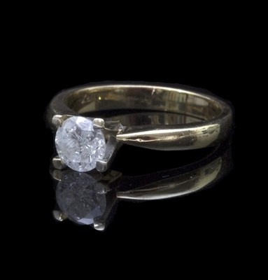 Lot 304 - A diamond solitaire ring, the stone of...