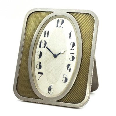 Lot 329 - An Art Deco clock by Tiffany & Co., the oval...