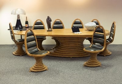 Lot 355 - A modern ash dining table of irregular oval...