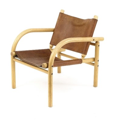 Lot 361 - A 20th Century beechwood open armchair, with...