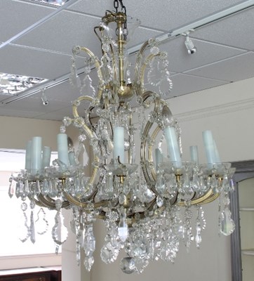 Lot 372 - A twelve-light cut glass chandelier with...