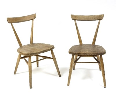 Lot 375 - A pair of Ercol stacking school chairs in elm...