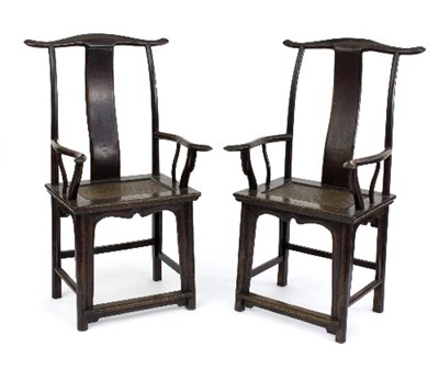 Lot 397 - A pair of Chinese yoke back chairs each with...