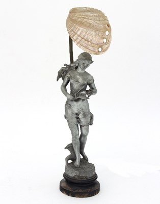 Lot 405 - An Art Nouveau figural table lamp modelled in...