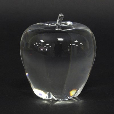 Lot 582 - Steuben, a clear glass apple paperweight,...