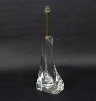 Lot 588 - Daum, a clear crystal glass lamp base of...