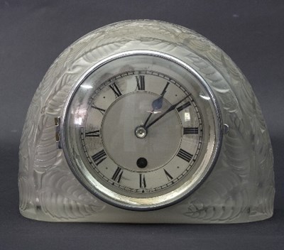 Lot 590 - Lalique, a Feuilles style glass mantel clock...