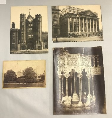 Lot 23 - A folder of old photographs including London...